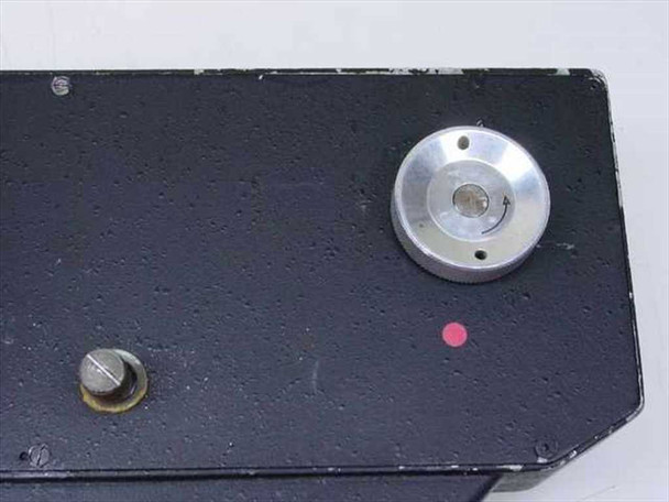 Photo-Sonic Take-Up Unit – top surface of housing showing silver drive spindle hub with center pin and red indicator dot
