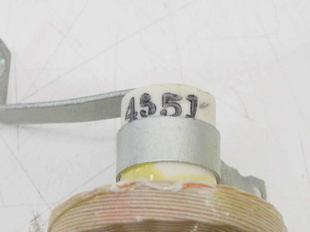 JW Miller Magnetics 4551 choke — close-up of ceramic bobbin core with part number 4551 hand-marked in black ink