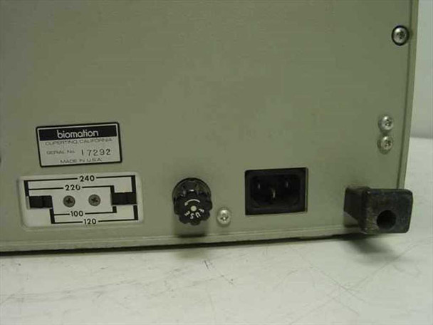 Rear panel label close-up showing Biomation serial number 17292, MADE IN USA label, 100/120/220/240V voltage selector switch, IEC power inlet, and DIN connector