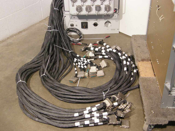 Maxsys VSX 465 cable harness — large braided multi-conductor cables with D-sub connectors laid out on floor
