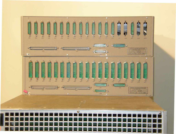 Rear view of Maxsys VSX 465 Type 2 and Type 1 switch boxes — rows of D-sub connectors (approximately 25+ connectors per unit), D-25 and D-37 style, plus connector banks on far right