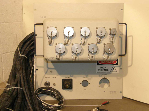 Maxsys VSX Interface Test Adapter P/N 465-1040 front panel — 10 high-voltage rotary connectors in two rows, NETWORK and IRIG-B ports at bottom, DANGER HIGH VOLTAGE warning sticker, voltage control knob