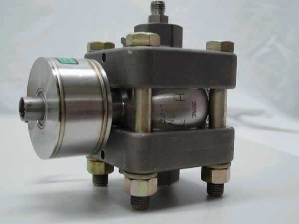 Schlumberger Statham PM6142 – 3/4 angled view showing full body assembly, bolted frame, sensor canister with green calibration label