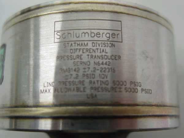Schlumberger Statham PM6142 – close-up of rating plate label: Statham Division, Differential Pressure Transducer, SN N6442, PM6142 ±7.2-22315, ±7.2 PSID 10V, Line Pressure Rating 5000 PSIG, Max Allowable Pressure 5000 PSID, USA