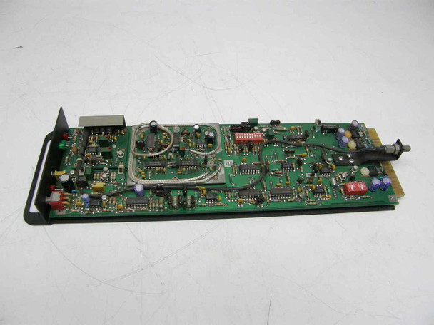 Artel R3050-840 PCB top-down view showing full green circuit board with through-hole and SMD components, DIP switches, and gold-edge card connector