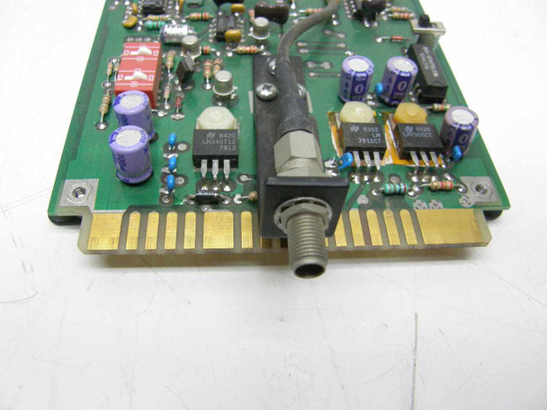Artel R3050-840 PCB close-up of edge connector end showing gold card-edge fingers, SMA-style coaxial connector, and component detail including National Semiconductor LM349 IC