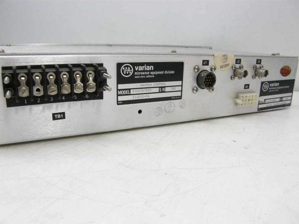 Varian VJC6767D8T7 VJC6767D5D Switch Control – close-up of rear panel showing TB1 terminal strip (positions 1–6), J1 multi-pin circular connector, and Varian Microwave Equipment Division label with model and part number