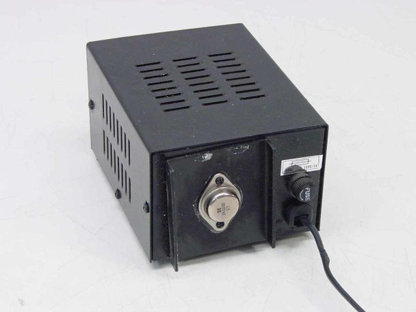 PHC-412J Regulated DC Power Supply right side and rear showing external power transistor heat-sinked to chassis, AC power cord, and blade fuse holder