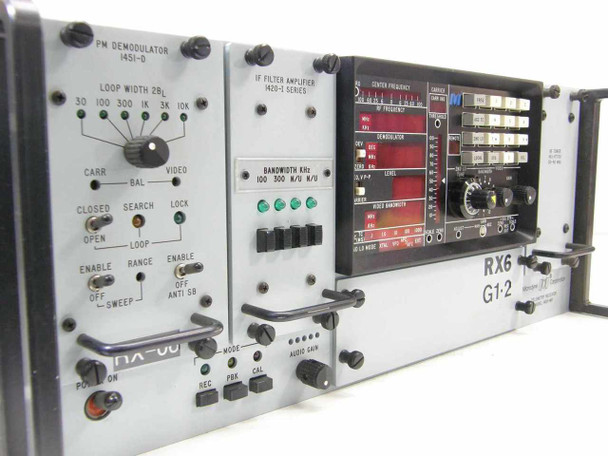 Microdyne 1400-MR front panel left side showing 1451-D PM Demodulator and 1420-I IF Filter Amplifier plug-ins with controls