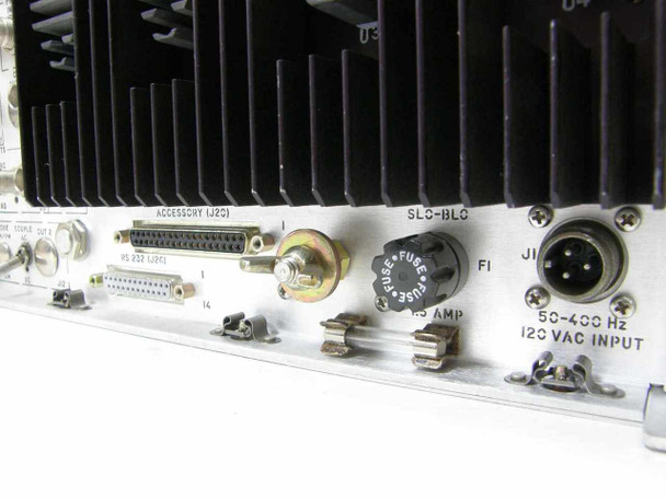 Microdyne 1400-MR rear panel detail showing RS-232 connector, SLC-BLC switch, fuse holders, and 4-pin 120 VAC power input connector