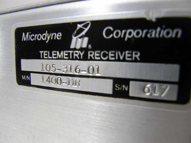 Microdyne Corporation data plate close-up showing Telemetry Receiver, part number 105-316-01, model 1400-MR, serial number 617