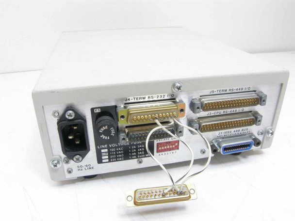 ICS Electronics 4835 rear panel showing J4 RS-232 I/O, J5 RS-449 I/O, J3 RS-449 I/O, J1 IEEE 488 GPIB connector, IEC AC inlet, fuse holder, and line voltage selection label
