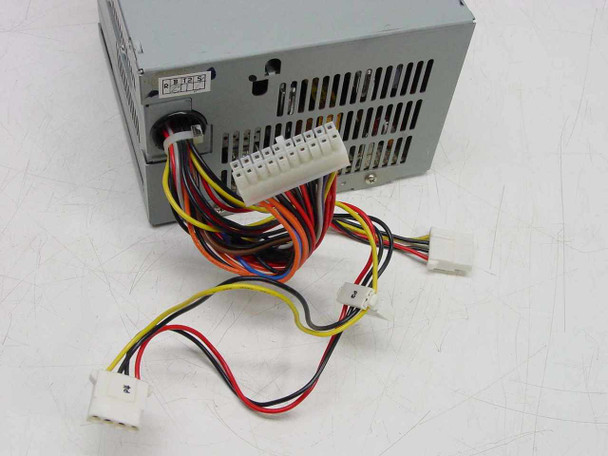 IBM Delta DPS-145PB-73 90W ATX power supply — top view showing 20-pin ATX main connector and full cable harness with Molex and floppy leads