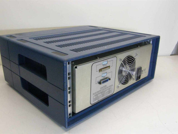 Tau-Tron STX-1101 Bit Error Rate Transmitter – rear panel and top view showing two rectangular interface connectors, cooling fan, and ventilation slots