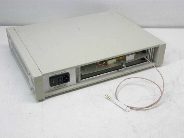 Hybricon 078-360 Reference Board Test Module – rear panel view showing IEC AC power inlet, label area, and attached SMA RF coaxial pigtail cable