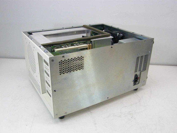 APW 06-01299300 HARP chassis rear-left angle view showing backplane, card connectors, and ventilation holes