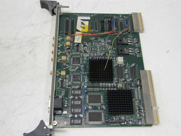 Rockwell Scientific NGI-Modem-XER1 Rev A OFDM modem CompactPCI card — top view showing PCB with heatsinks, SMA RF connectors, and edge connector