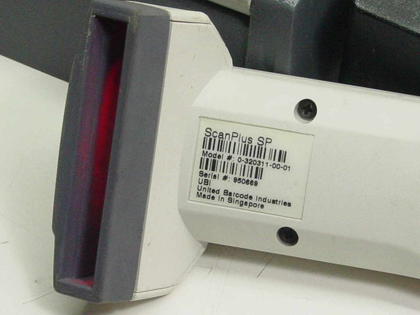 UBI ScanPlus SP laser barcode scanner label showing Model 0-320311-00-01, UBI branding, Made in Singapore