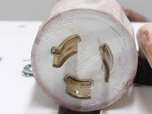 250V twist-lock cord plug face view showing 3-prong locking configuration (L6-15 style) for the Ruud Lighting ICM2640 low bay fixture