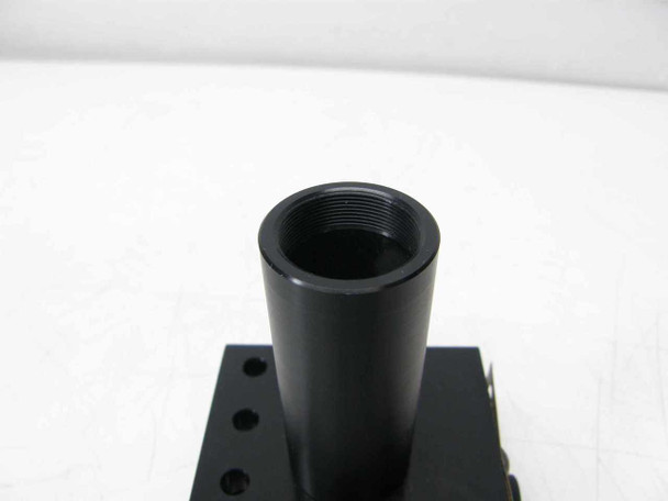 Close-up top view of removable threaded optical tube showing internal threading and black anodized finish