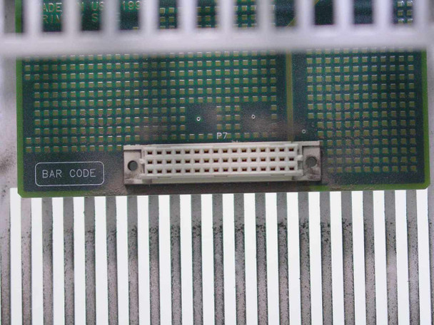 Cabletron 6C105 backplane edge connector close-up — P7 labeled connector on green PCB with 'BAR CODE' silk-screen label visible