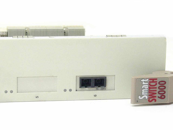 Cabletron 6E123-50 side view showing FE-100FX dual SC fiber optic uplink port and SmartSwitch 6000 module ejector handle