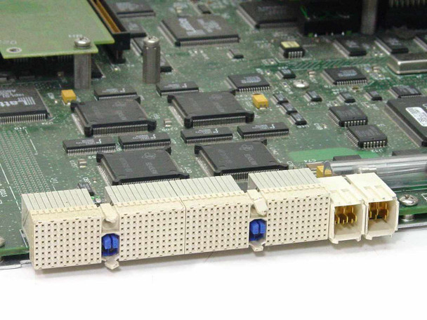 Cabletron 6E123-50 PCB close-up showing high-density backplane edge connector with blue retention clips and multiple processor ICs