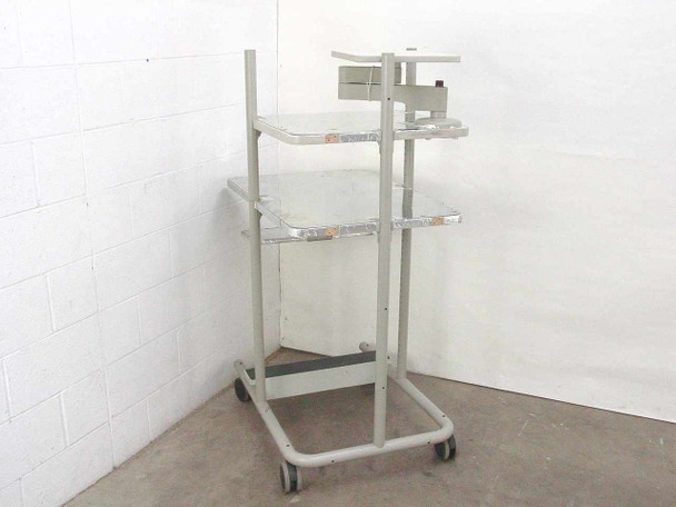 Anthro rolling computer cart three-quarter right side view showing shelf configuration and monitor arm assembly