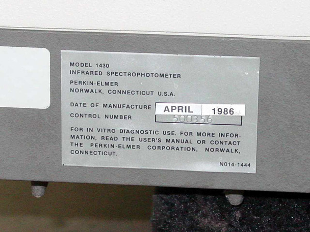 Perkin-Elmer 1430 data plate label showing Model 1430 Infrared Spectrophotometer, Perkin-Elmer Norwalk Connecticut USA, Date of Manufacture April 1986, Control Number 500356, and For In Vitro Diagnostic Use notation