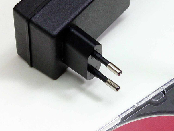Belkin F5D6130 power supply (HPW-1009U) showing European plug style, close-up detail