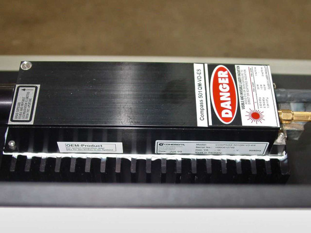 Coherent Compass 501QM-VD-ES green laser module — label showing OEM product designation, Coherent branding, and DANGER laser warning