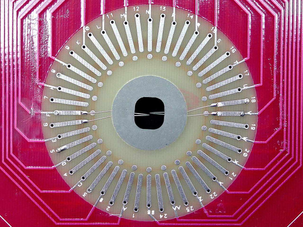 SV Probe C48-2 888008 close-up of circular spring-pin probe contact array with numbered and lettered pads radiating outward from center hub