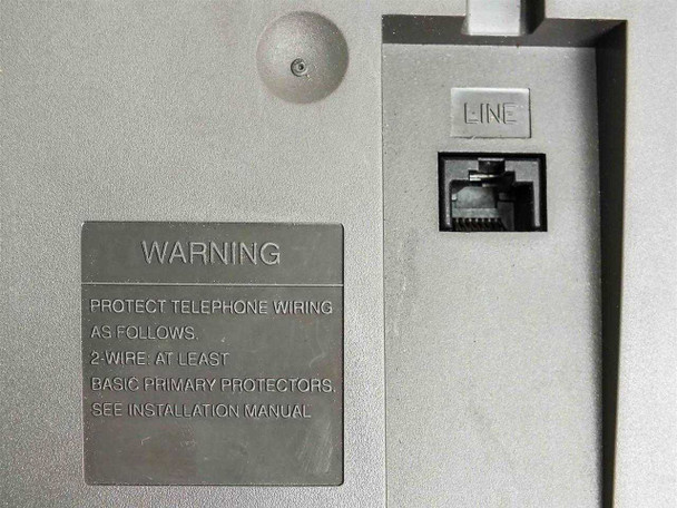 Lucent 6408Plus bottom rear panel showing RJ11 LINE port and telephone wiring warning label