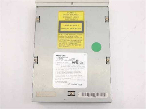 Mitsumi CRMC-FX400D CD-ROM drive – top view showing Class 1 laser warning label, Mitsumi rating plate, and November 1995 manufacture date