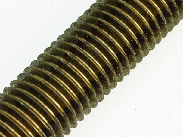 Macro view of 7/8"-9 TPI all thread rod threads showing galvanized oiled surface finish and thread detail