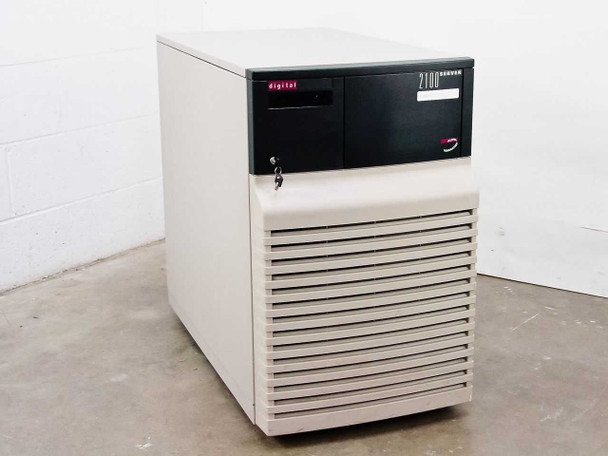Digital DEC AlphaServer 2100 450AP-A9 BA740 tower server – front 3/4 view showing beige chassis, black top panel with digital logo and 2100 SERVER branding, louvered side panel, and key lock