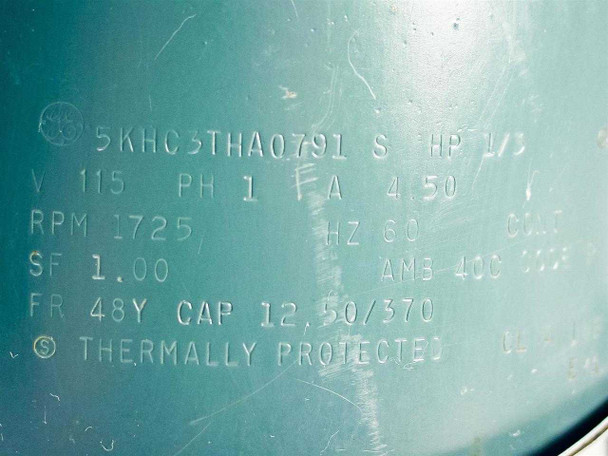 GE motor nameplate embossed on DIA-VAC 01310TQ motor body showing model 5KHC3THA0791, 1/3 HP, 115V, 1-phase, 4.50A, 1725 RPM, 60Hz, Frame 48Y, thermally protected