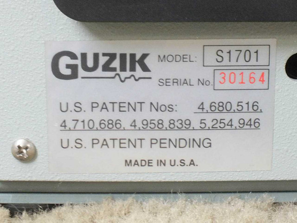 Guzik S1701 model label — shows Model S1701, Serial No. 30164, U.S. Patent numbers, and Made in U.S.A.
