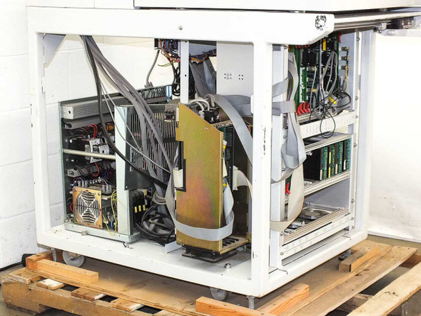 F&K Delvotec 6320 interior base cabinet view showing power supply, servo amplifiers, and wiring harnesses