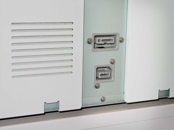 Kyocera Mita FS-9500DN rear interface panel close-up – dual USB-style interface ports on rear panel