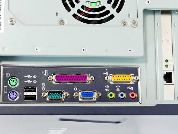Dell SmartStep 100D rear I/O panel close-up – PS/2 mouse and keyboard ports, 2x USB, serial, parallel, VGA, dual audio jacks, LPT port, and RJ-45 NIC port
