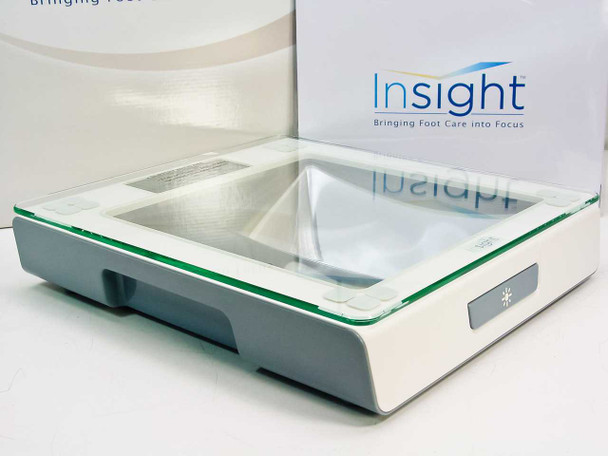 Insight 1380 scale side profile view showing white housing, glass platform, green accent trim, and mirror cavity