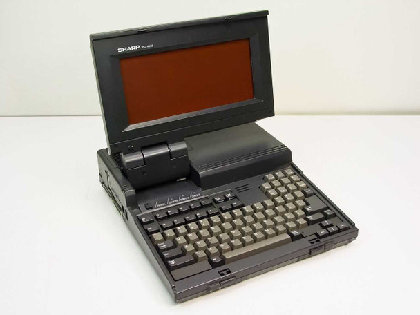 Sharp PC-4502 PC-4500 laptop open showing amber EL display screen, full keyboard, and built-in printer unit