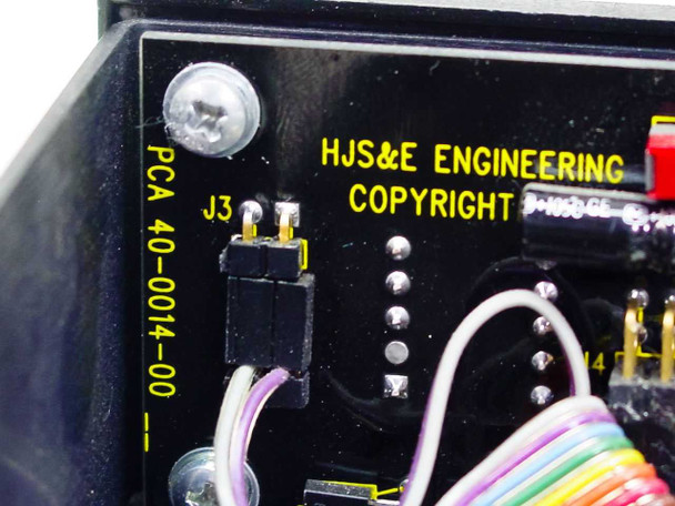 HJS&E Engineering PCA 40-0014-00 – close-up of internal PCB silkscreen showing part number PCA 40-0014-00, HJS&E Engineering copyright marking, and J3 header