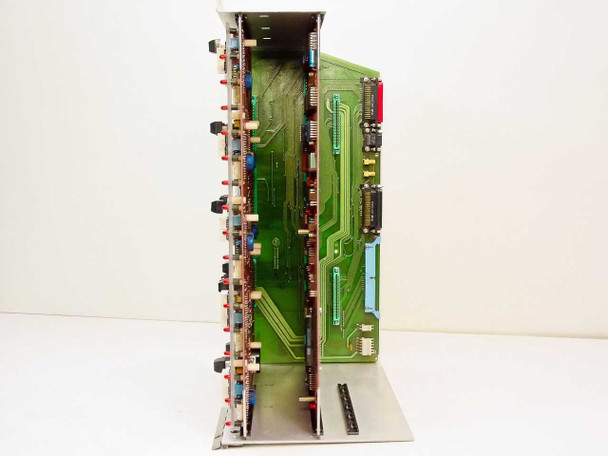Varian Klystron Gen II board set side view — full assembly in aluminum card cage showing green Patch Panel Board edge connectors and rear of red logic boards with multiple DIP switch arrays