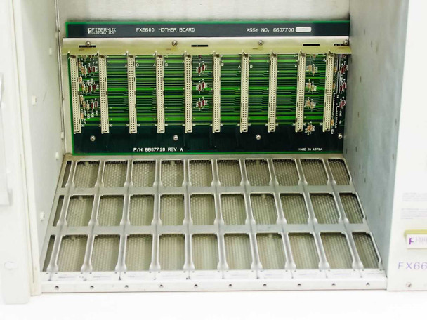 Fibermux FX6600 motherboard P/N 6607710 Rev A installed in chassis showing multiple card edge connectors and backplane layout