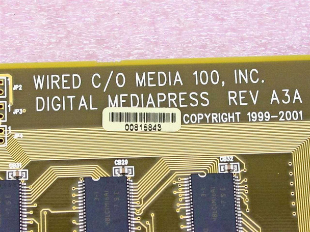 Media 100 DMP1 Supercharger PCB close-up showing 'WIRED C/O MEDIA 100, INC. DIGITAL MEDIAPRESS REV A3A' silkscreen label and barcode sticker 00816849