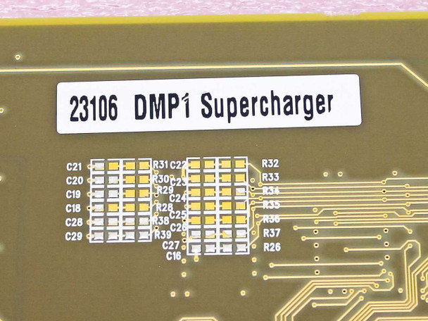 Close-up of '23106 DMP1 Supercharger' label affixed to the PCB rear side