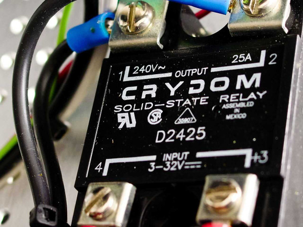 Close-up of Crydom D2425 solid-state relay — 240V AC output, 25A, 3-32V DC input