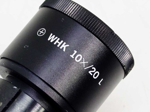 Olympus WHK 10X/20 L eyepiece barrel close-up showing model markings and knurled focus ring